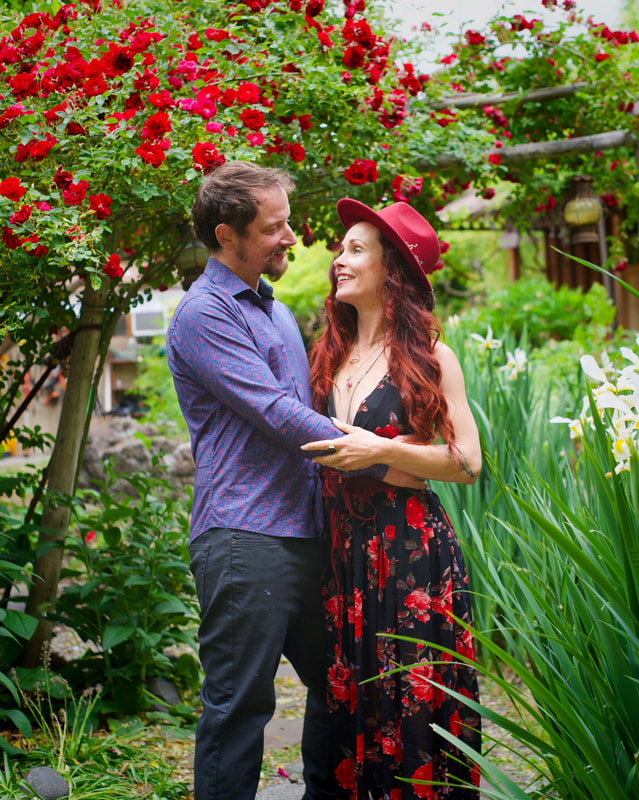 portrait of couple getting engaged in a garden in Mt. Shasta by Christal Sharp